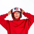 Bucked Up Trucker Hat – White/Blue/Red Flag Logo